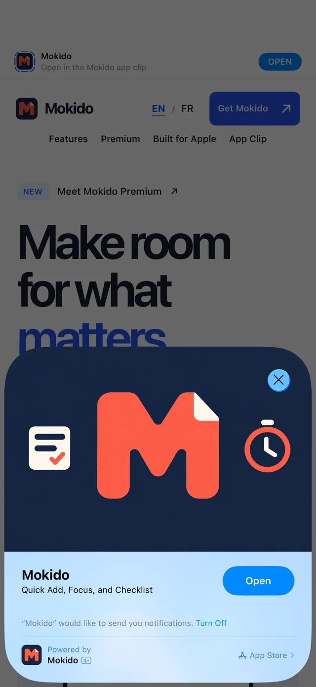 Fiche de lancement de l’App Clip de Mokido sur iPhone, avec le M corail, une liste de contrôle, un minuteur et le bouton Open.